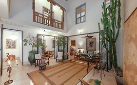 Riad Le J